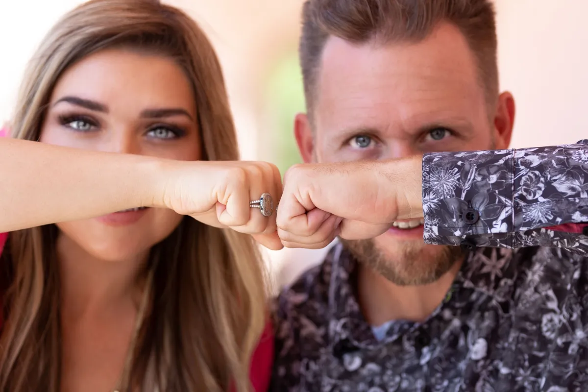 Bryan and Stephanie Dulaney bumping fists